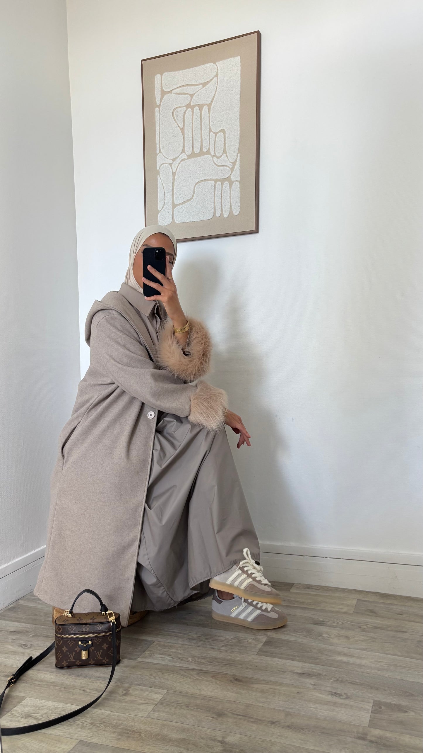 Manteau à capuche fourrure