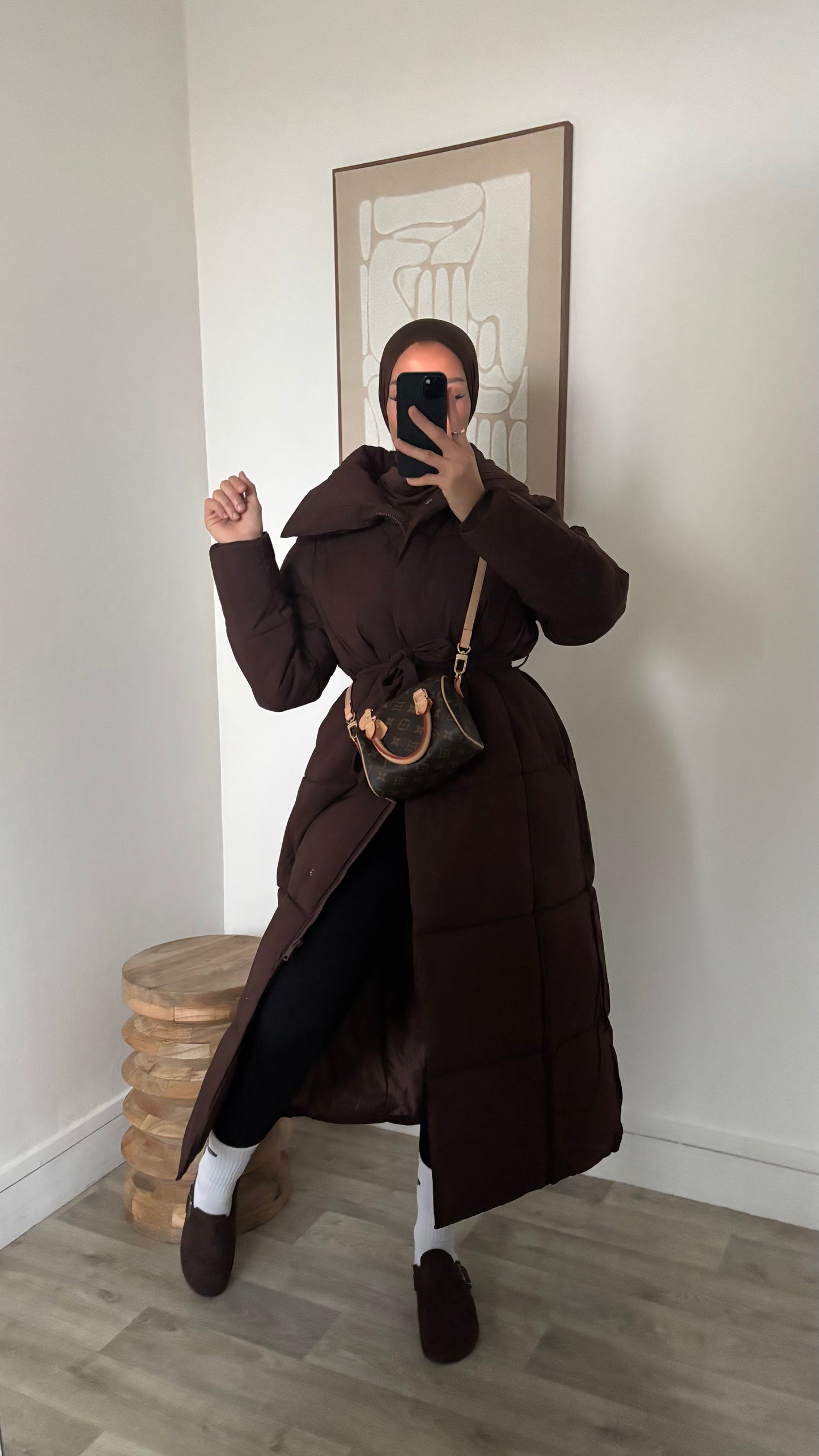 Doudoune col à fermeture et bouton pression