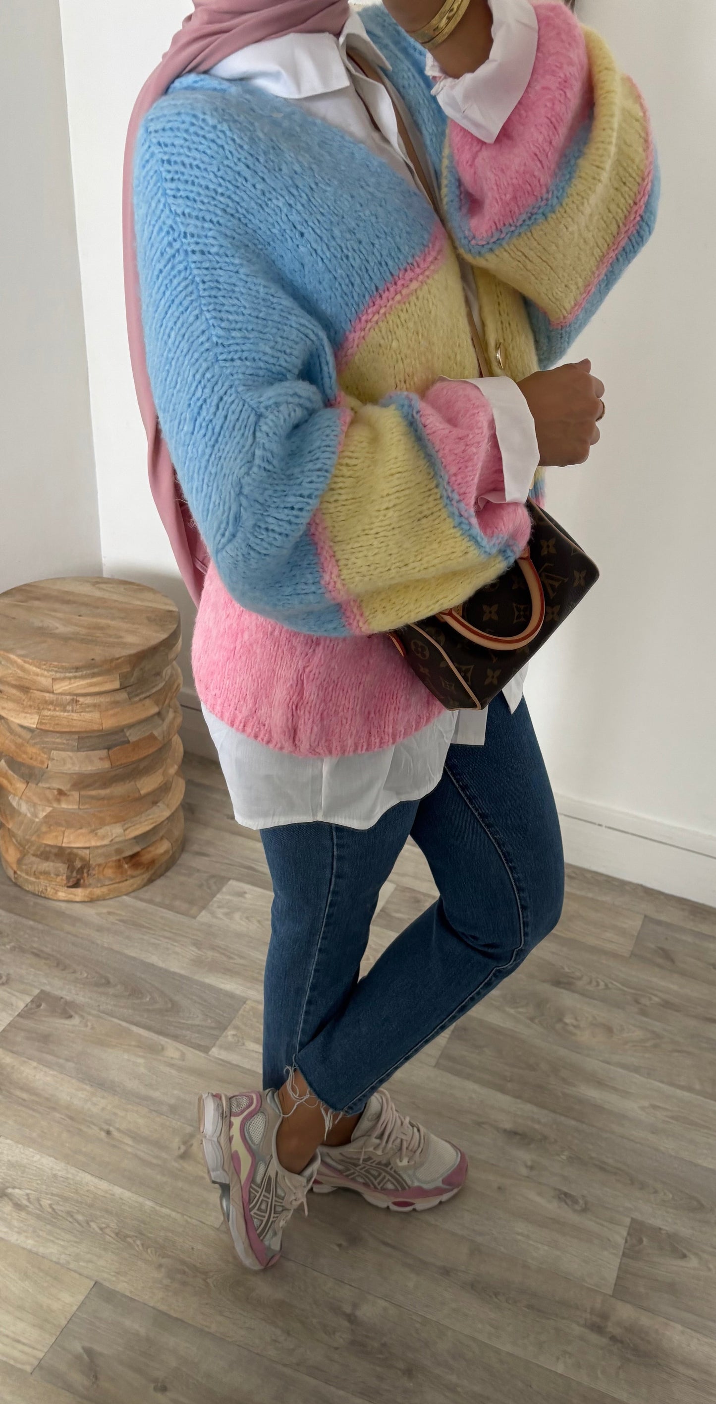 Gilet à bouton dorée