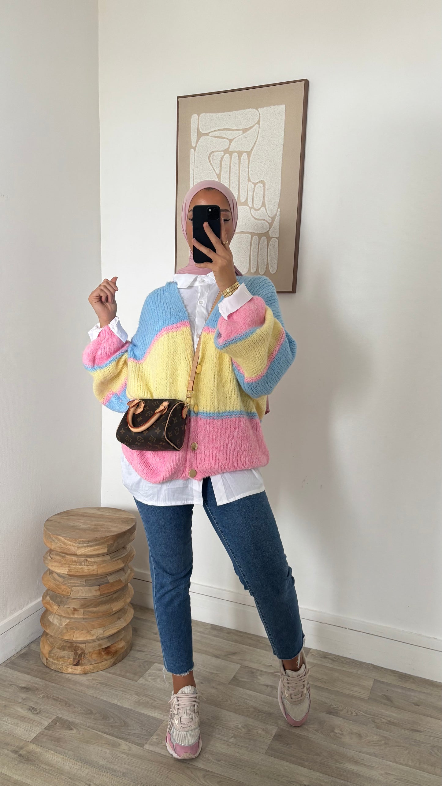 Gilet à bouton dorée