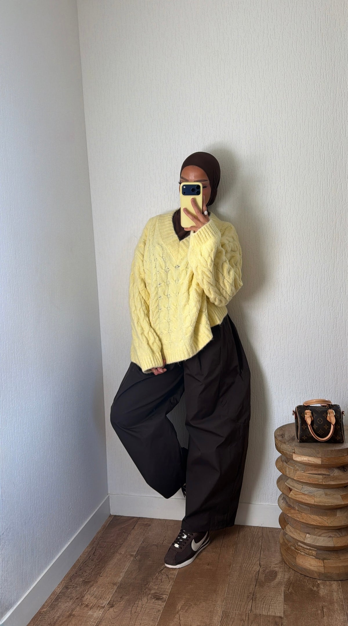Pull tressé col V