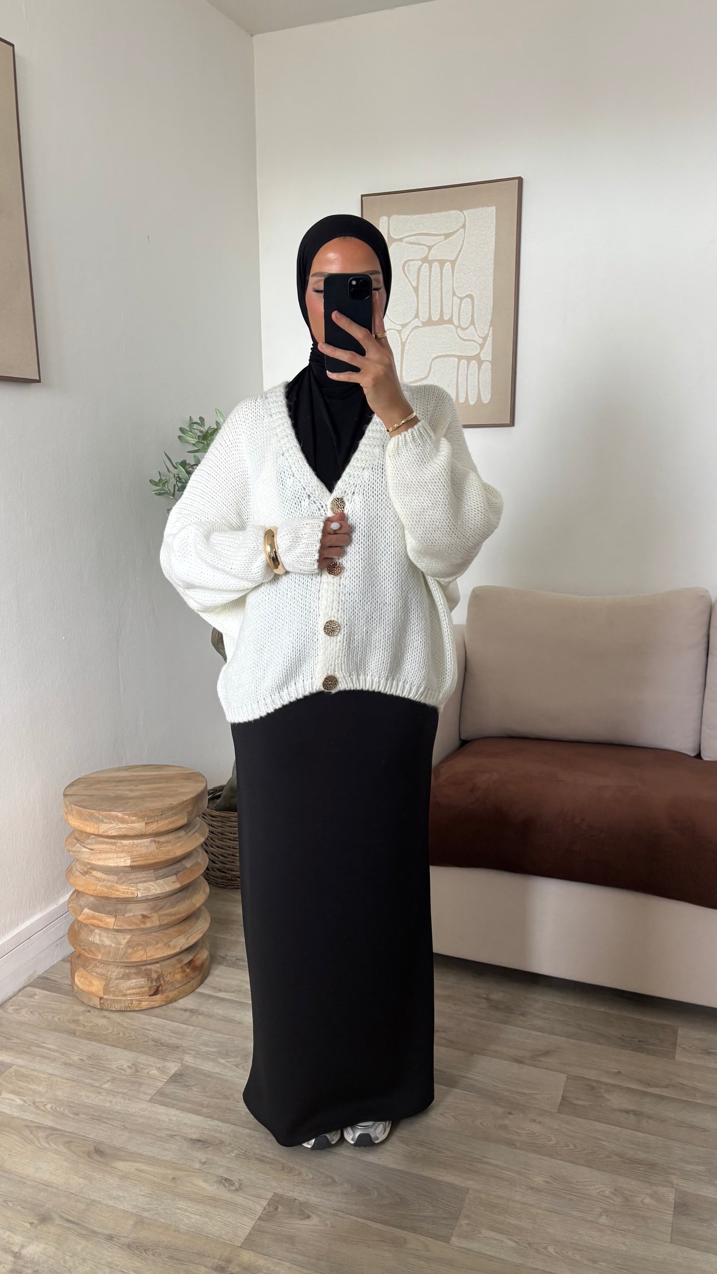 Gilet à bouton dorée