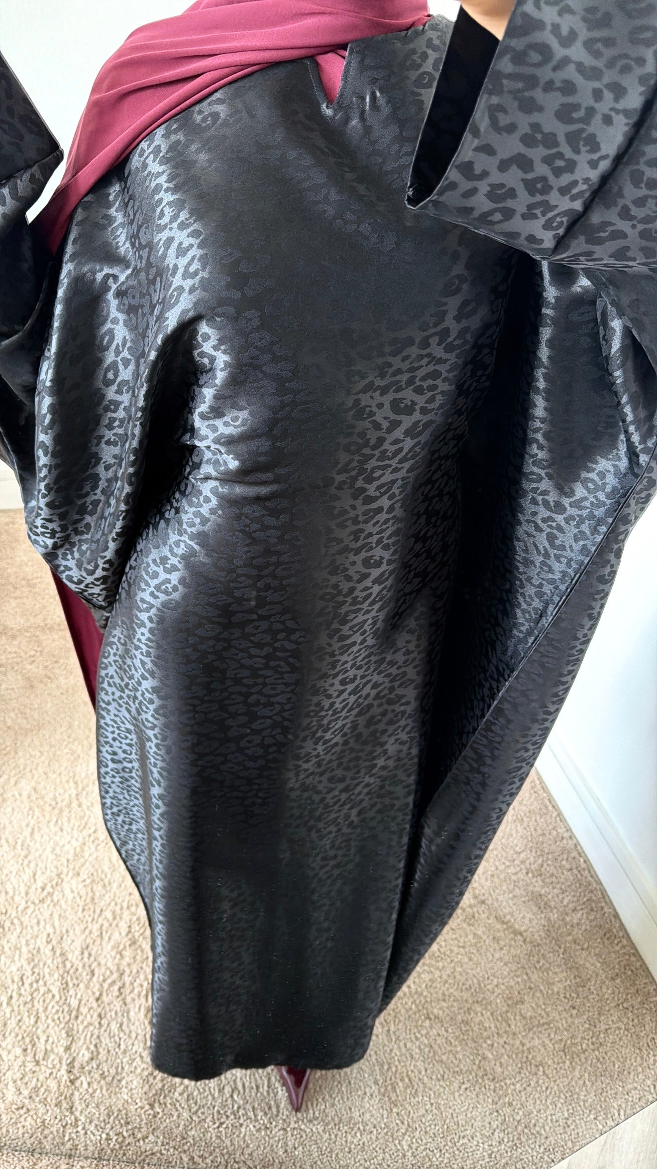 Robe léopard ajustable