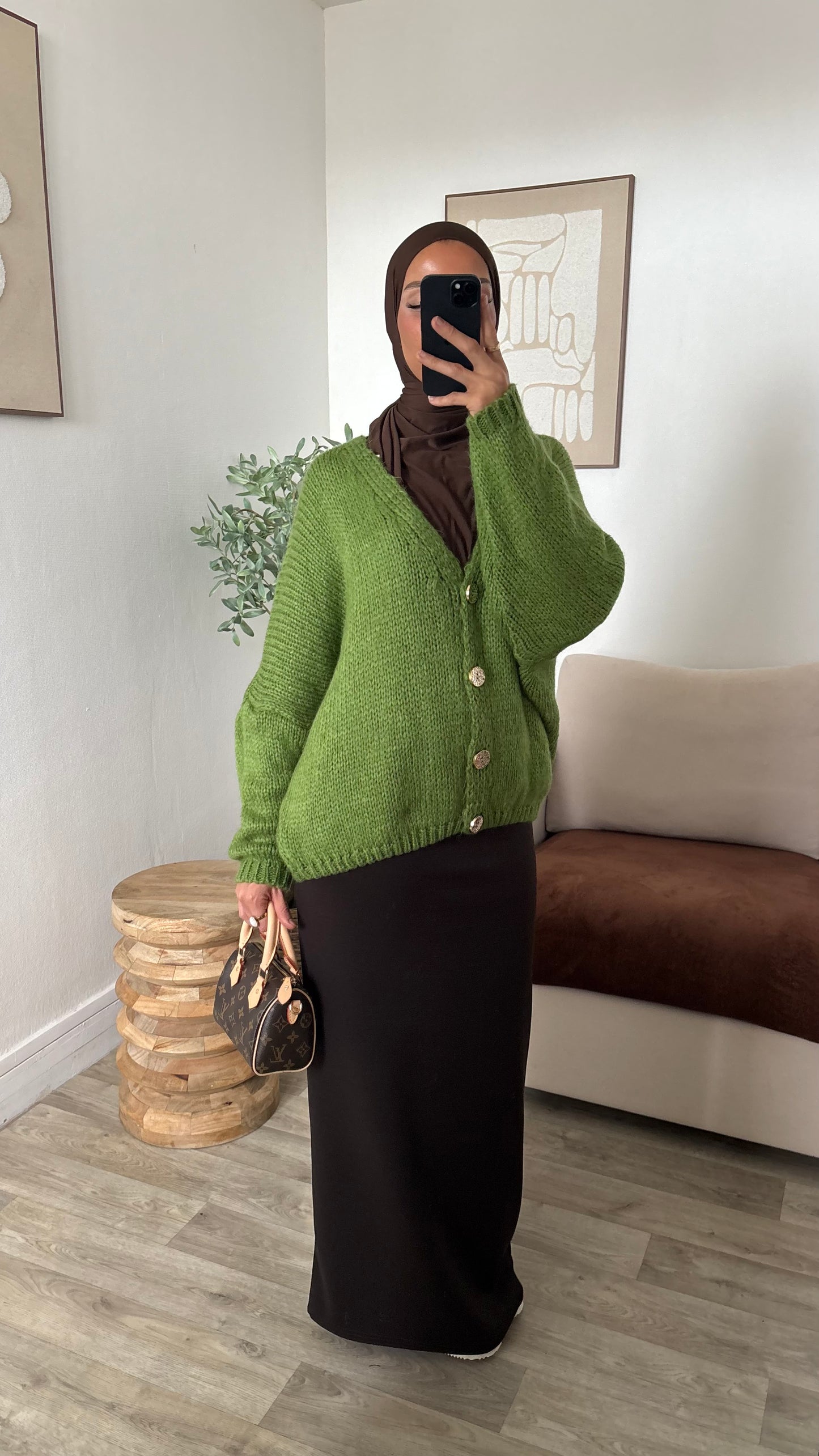 Gilet à bouton dorée