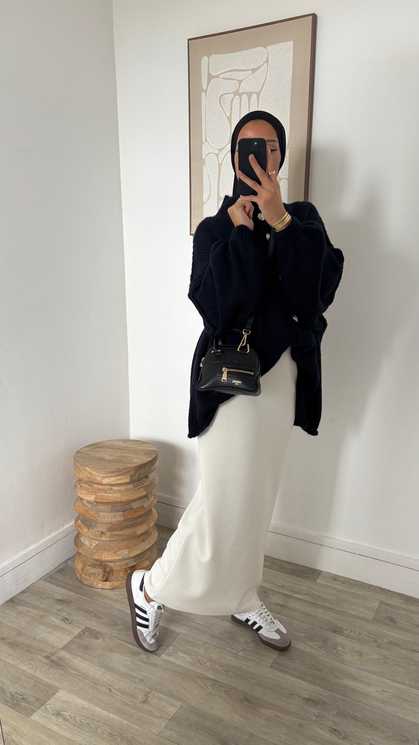 Pull cardigan en laine à boutons dorée