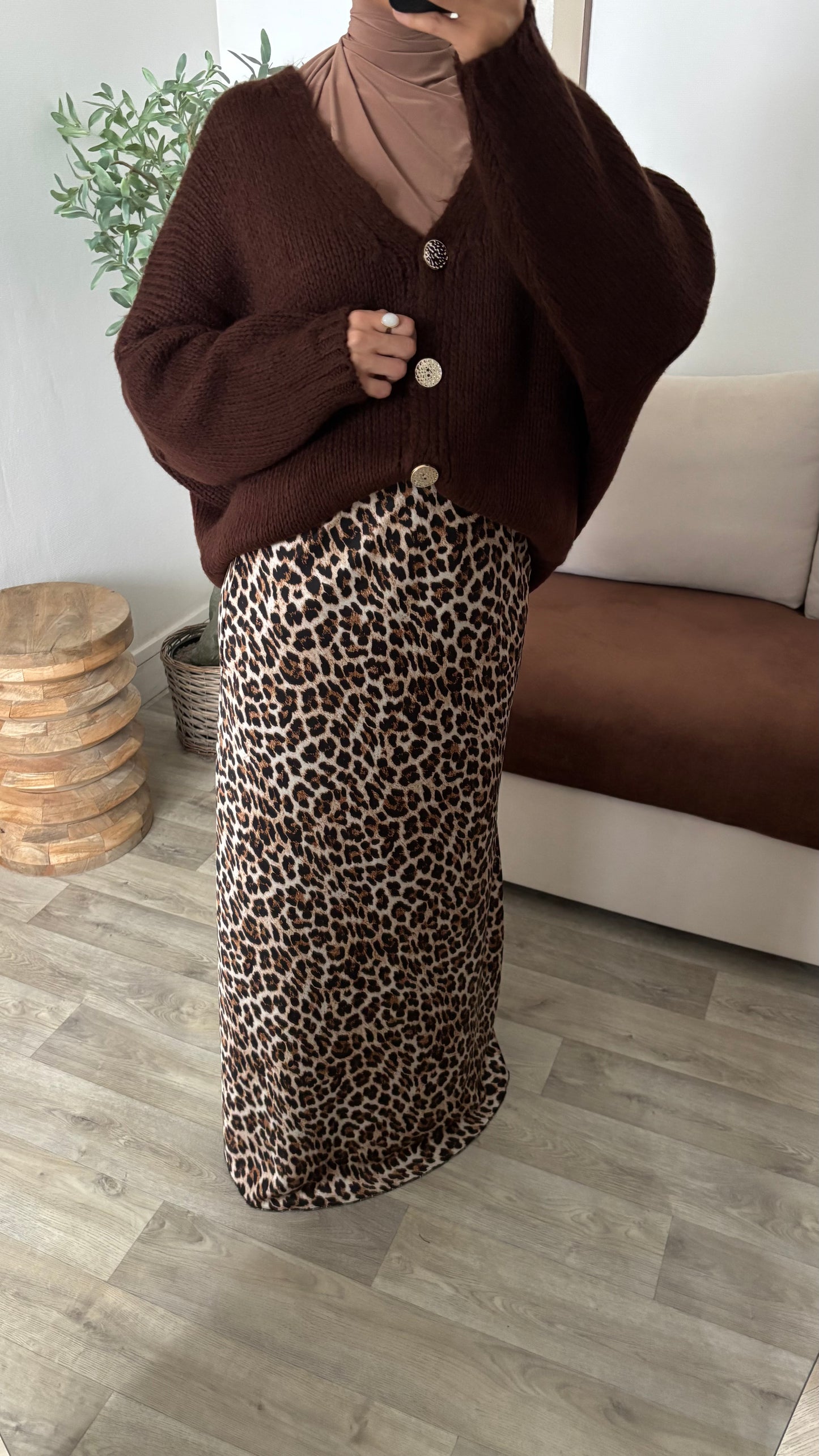 Gilet à bouton dorée