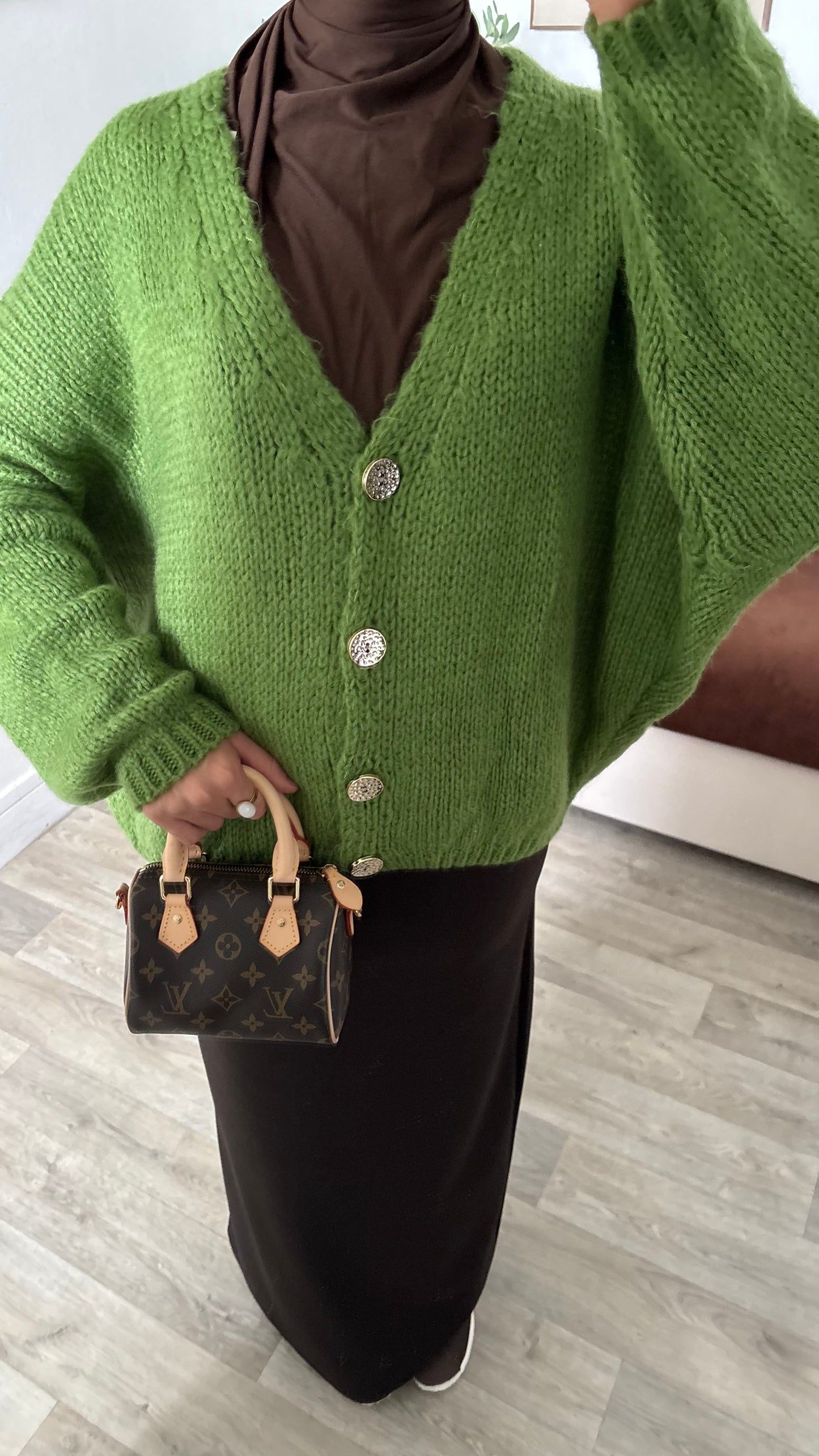 Gilet à bouton dorée