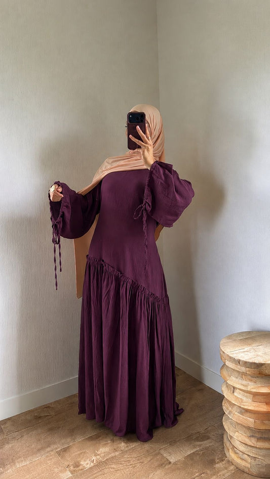 Robe ajustable au dos et au manches